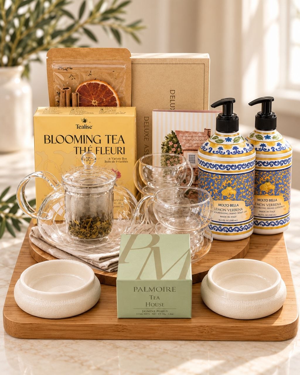The Signature Welcome closing gift collection arranged on a serving tray